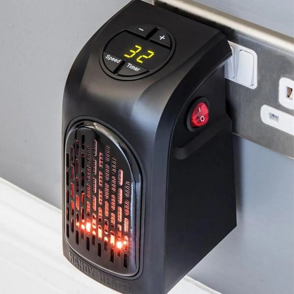 Портативний обігрівач з терморегулятором від мережі 400 Вт Handy Heater Керамічний тепловентилятор в розетку 6638 фото