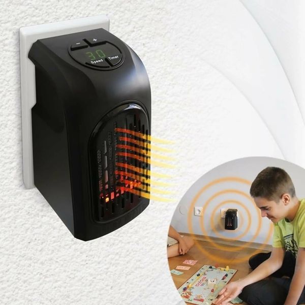 Портативный обогреватель с терморегулятором от сети 400 Вт Handy Heater Керамический тепловентилятор в розетку. 6638 фото